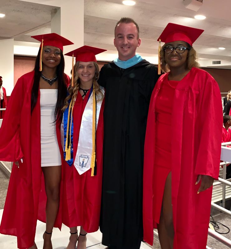 Brock at Graduation With His Basketball Players