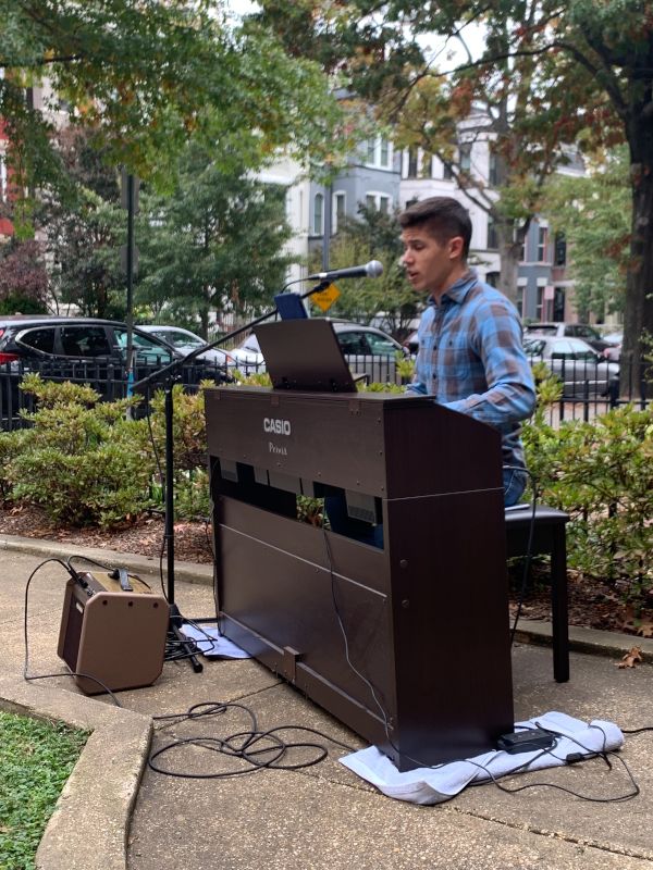 Anthony Performing His Children's Musical in the Front Yard