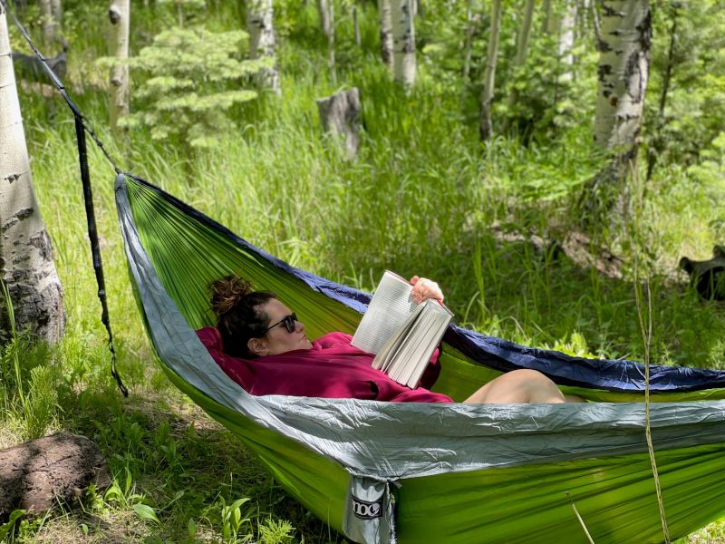 Ellie Loves Reading in the Hammock While Camping