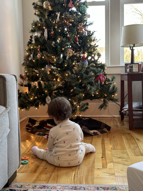 Ava Playing by the Tree
